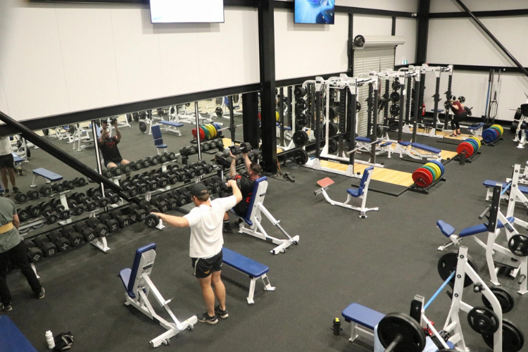 An interior view of CountryFit Gym in Mudgee, showcasing a variety of free weights and machines.